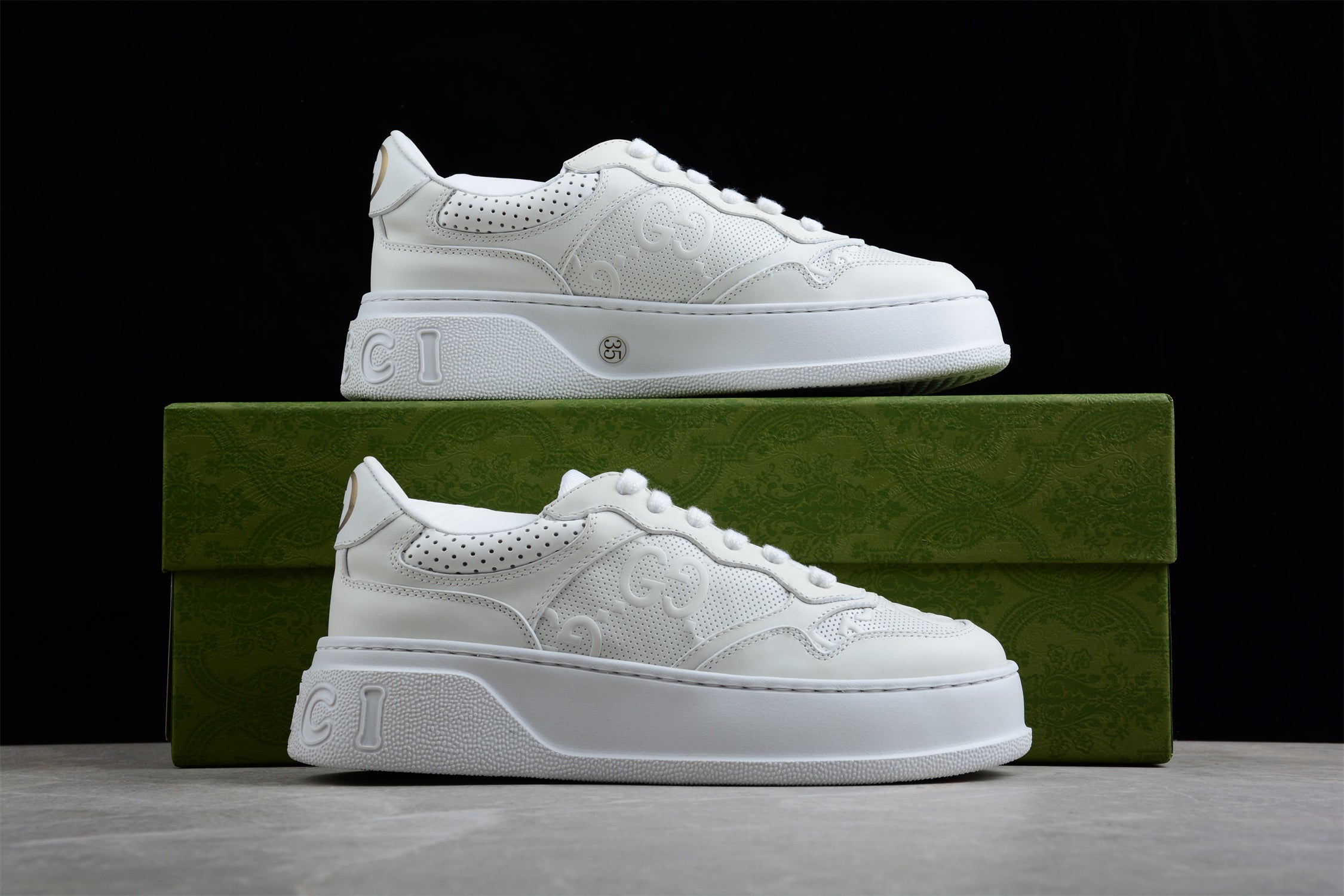 GucciUnisex Embossed GG Logo - White