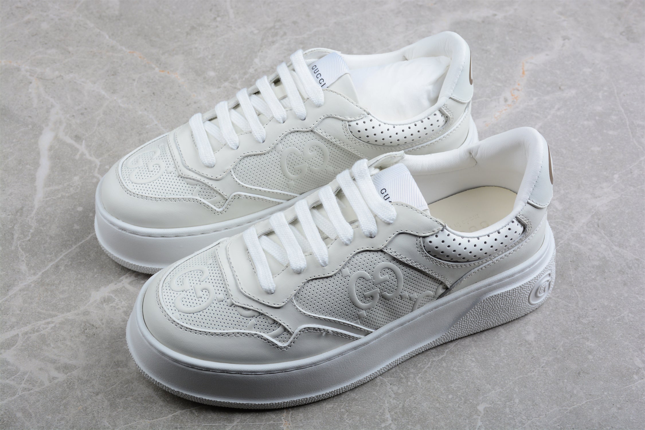 GucciUnisex Embossed GG Logo - White